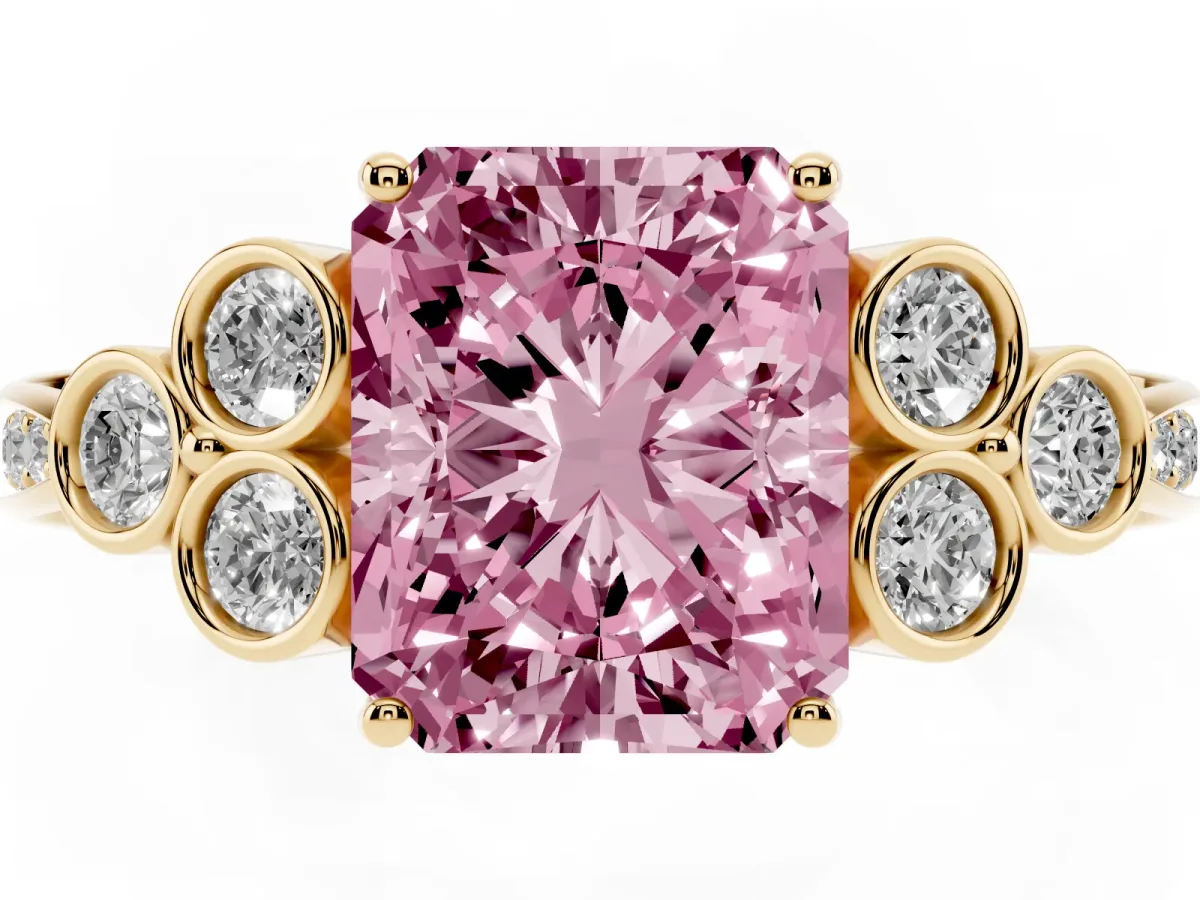 Fancy Pink Radiant Cut Cut Diamond Engagement Ring with Bezel Set Round Side Stones and Prong Setting Yellow gold