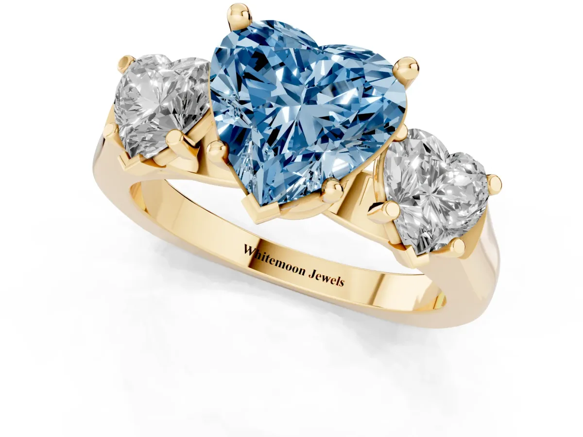 Fancy Blue Three-Stone Heart Cut Brilliant Diamond Trellis Ring with Comfort Fit Band Yellow gold