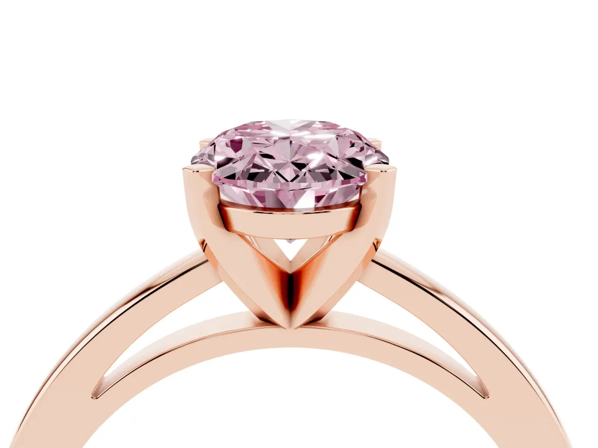 Fancy Pink Oval Cut Solitaire Diamond Engagement Ring with Four-Prong Setting on a Classic Band Rose gold