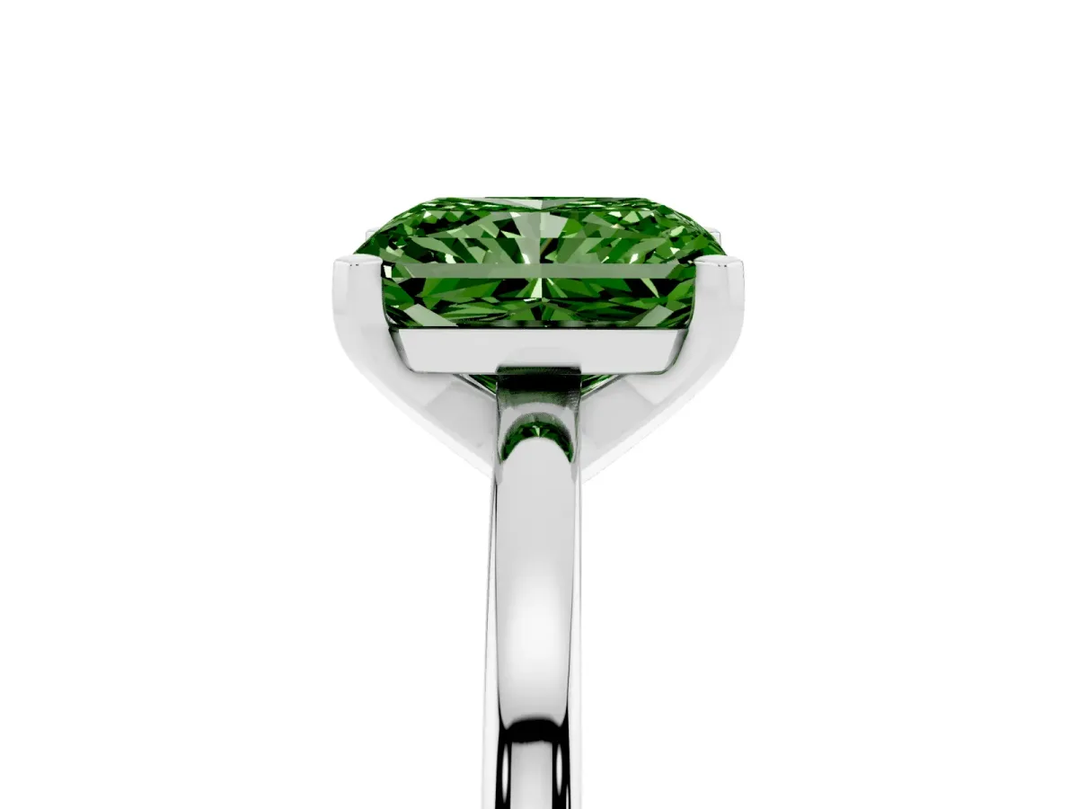 Fancy Green Radiant Cut Solitaire Diamond Engagement Ring with Four-Prong Setting on a Classic Band Silver