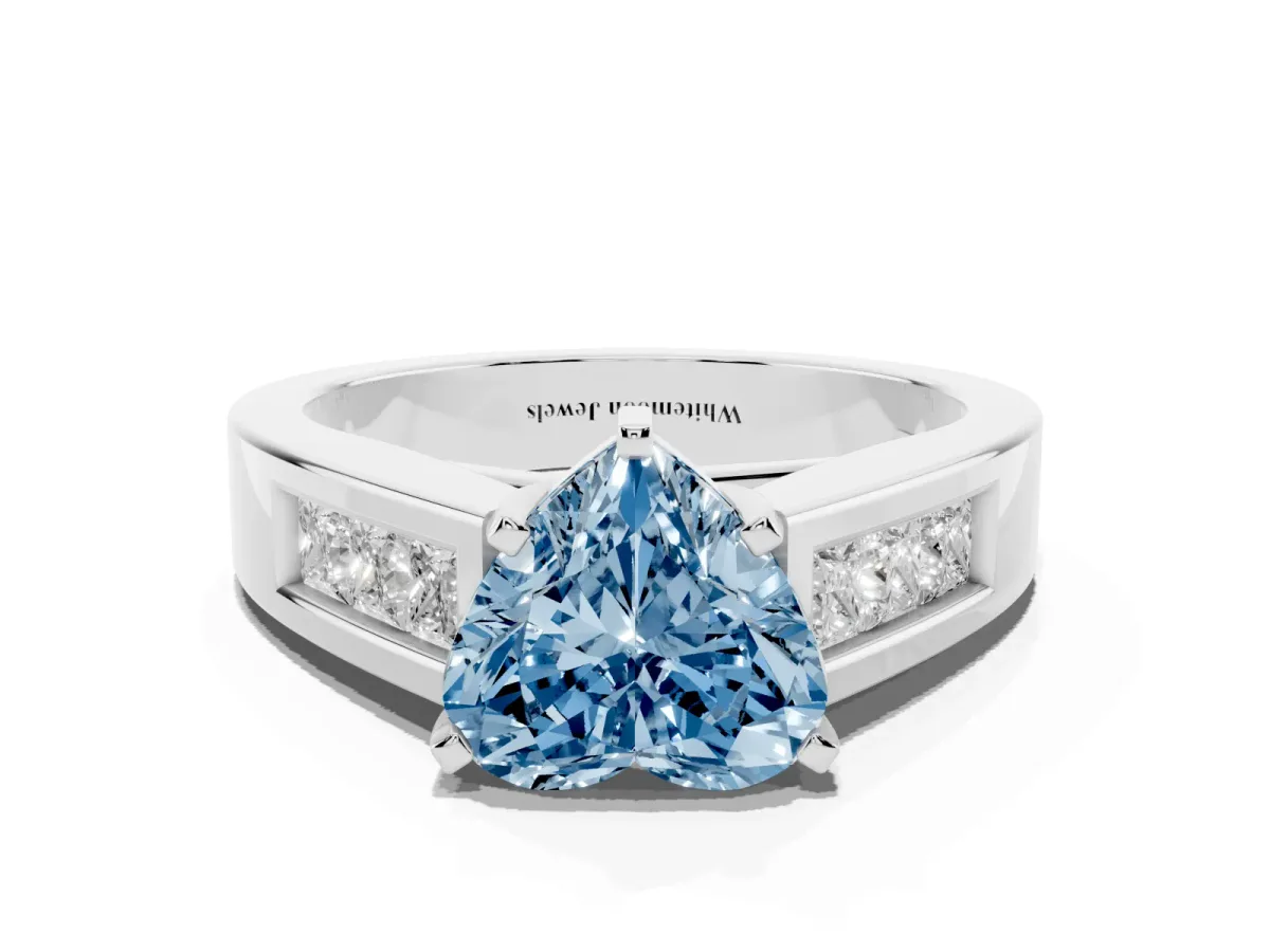 Fancy Blue Heart Cut Cut Channel Set Solitaire Ring with Four-Prong Setting Silver