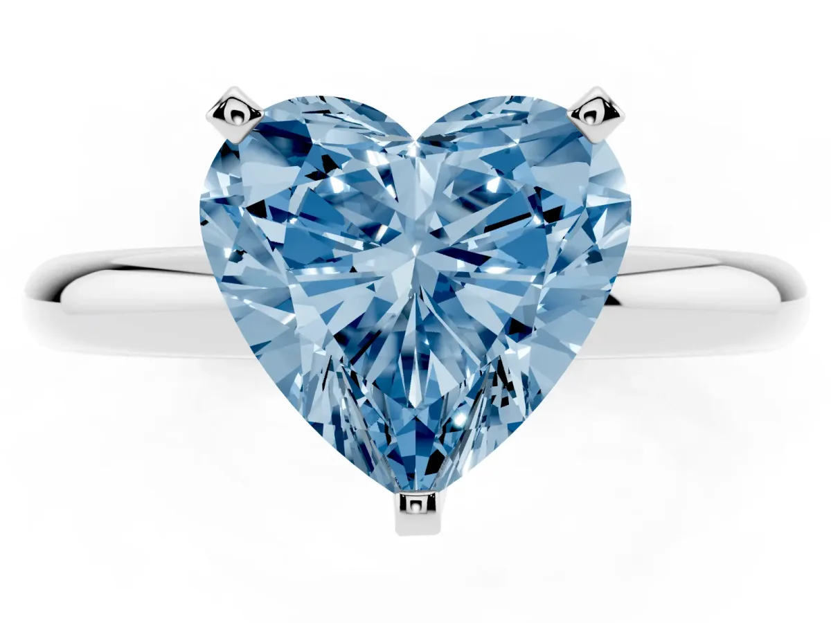 Fancy Blue Heart Cut Diamond Solitaire Engagement Ring with Round Band and Four-Prong Setting White gold