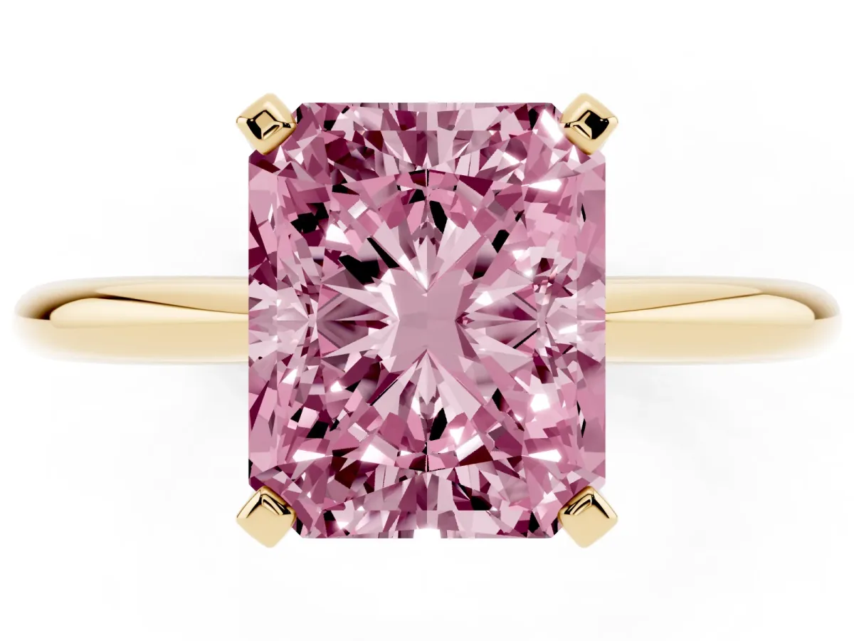Fancy Pink Radiant Cut Diamond Solitaire Ring with Prong Setting and Classic Band Yellow gold