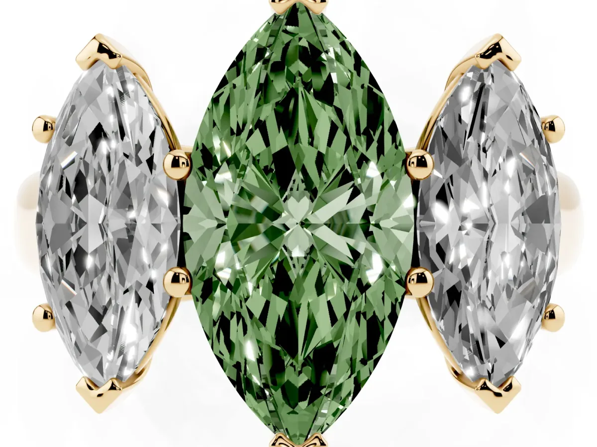 Fancy Green Marquise Cut Three-Stone Diamond Ring with Prong Setting on a Classic Band Yellow gold