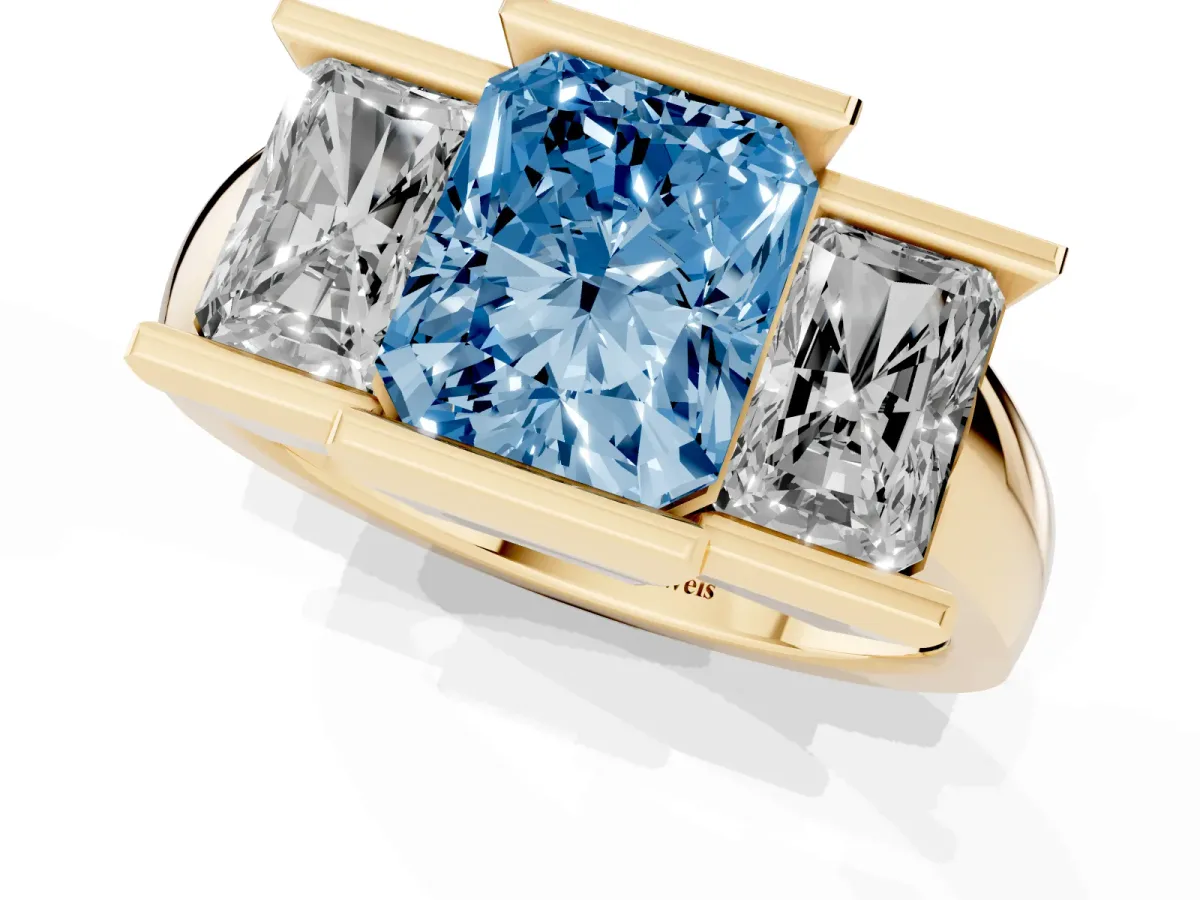 Fancy Blue Three Stone Radiant Cut Cut Channel Set Diamond Ring Yellow gold