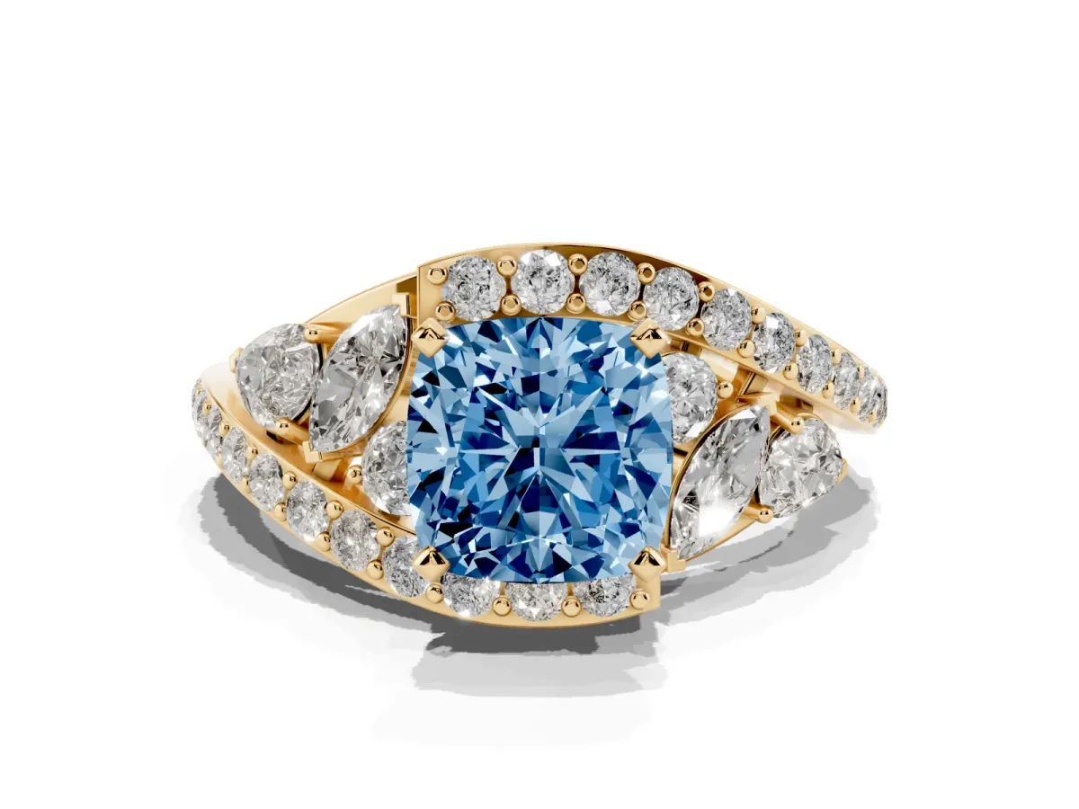 Fancy Blue Cushion Cut Diamond Halo Ring with Marquise and Pavé Band in Prong Setting Yellow gold