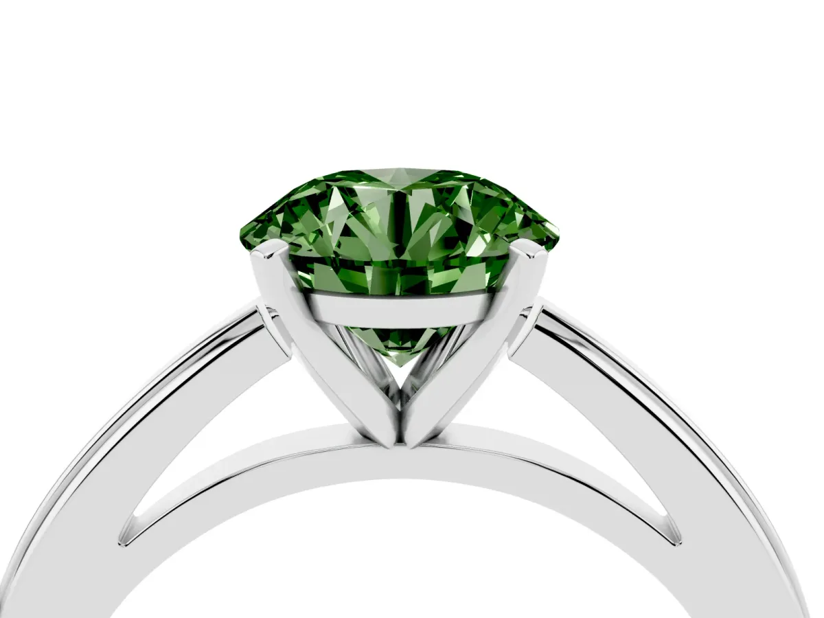 Fancy Green Round Cut Solitaire Diamond Ring with Four-Prong Setting and Classic Band Silver
