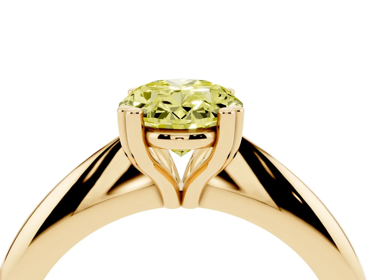 Fancy Yellow Oval Cut Cut Solitaire Engagement Ring with Tapered Band and Four-Prong Setting Yellow gold