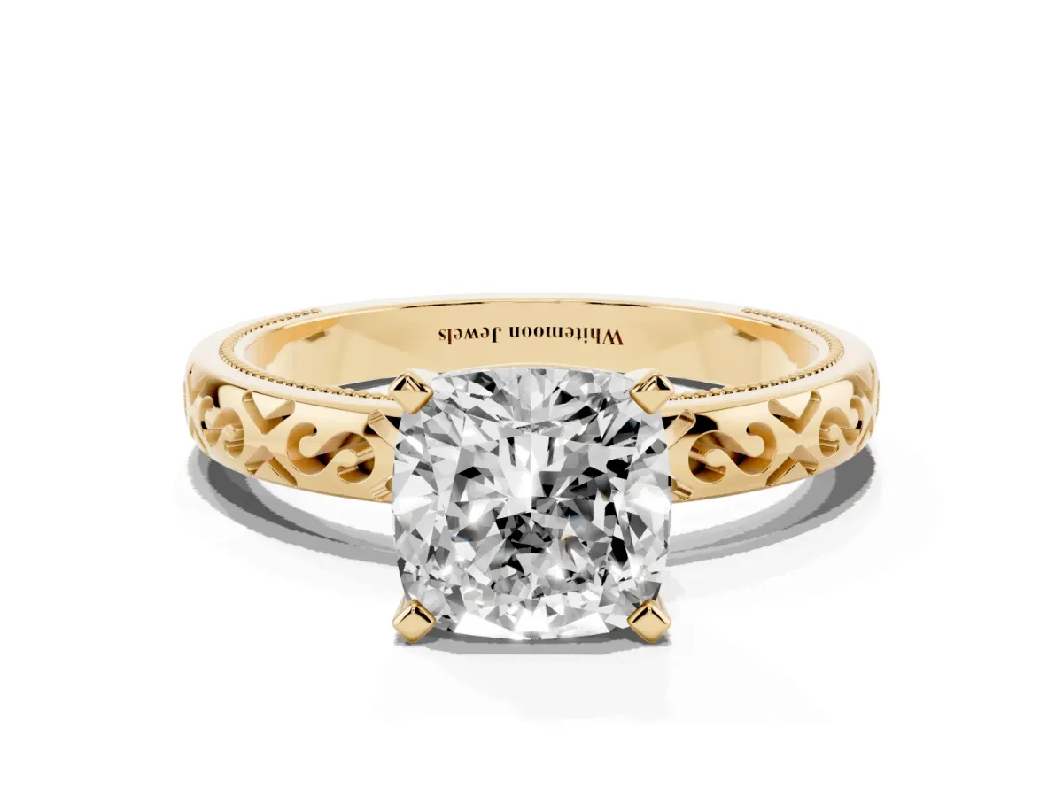 Cushion Cut Solitaire Engagement Ring with Scrollwork Band and Four-Prong Setting Yellow gold