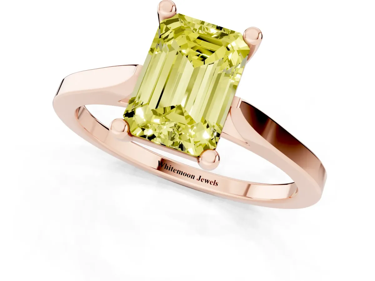 Fancy Yellow Emerald Cut Solitaire Diamond Ring with Four-Prong Setting and Tapered Band Rose gold