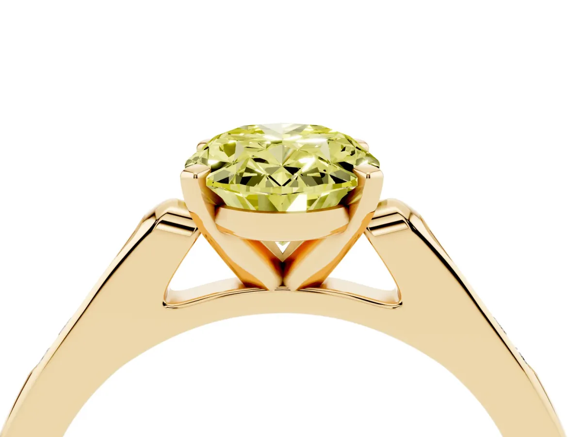 Fancy Yellow Oval Cut Diamond Solitaire Ring with Channel Set Round Band and Prong Setting Yellow gold