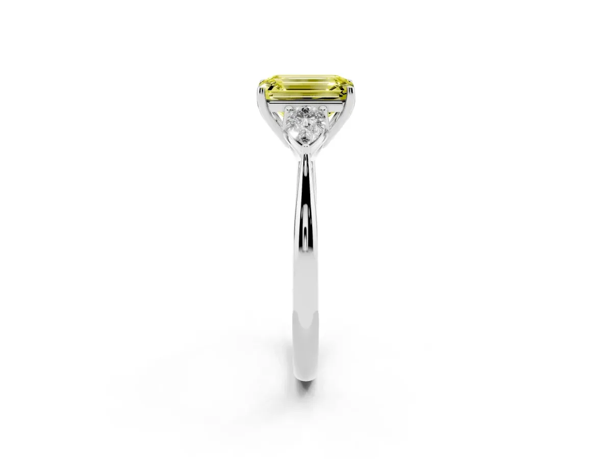 Fancy Yellow Three-Stone Emerald Cut Diamond Ring with Pear Side Stones in Four-Prong Setting Silver