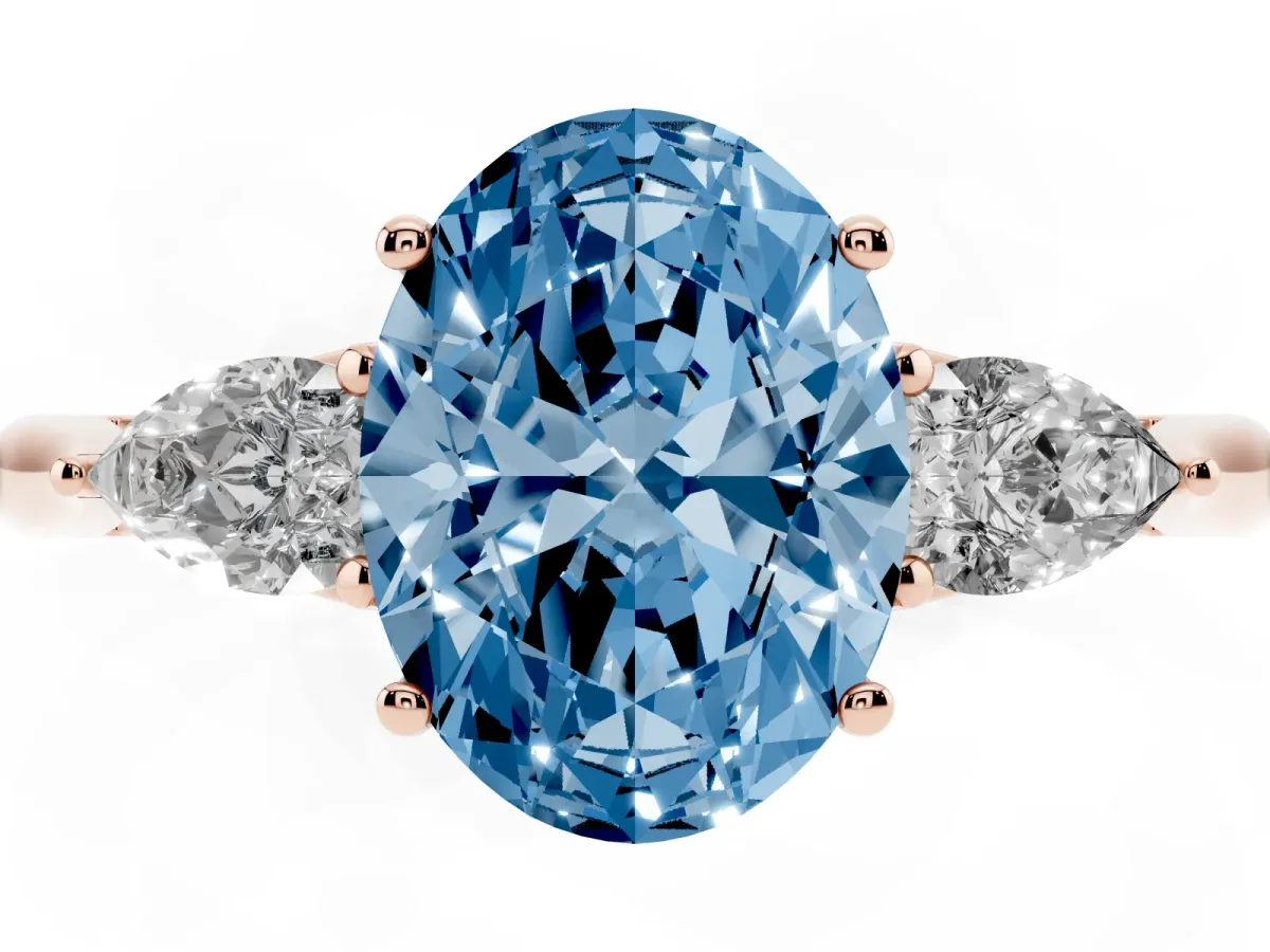 Fancy Blue Three-Stone Oval Cut Brilliant Diamond Solitaire Ring with Tapered Band and Four-Prong Setting Rose gold