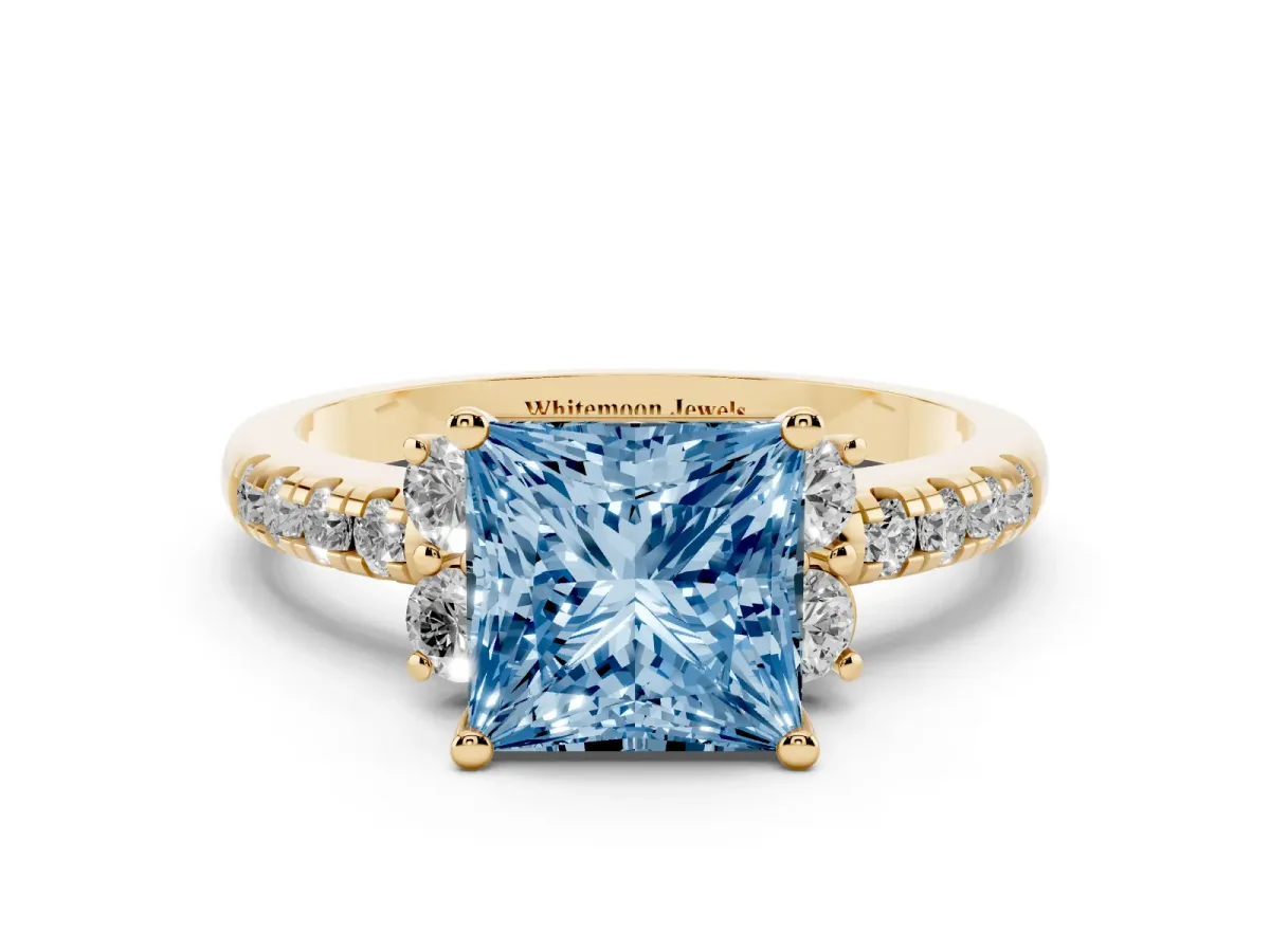Fancy Blue Princess Cut Diamond Three-Stone Pave Band with Four-Prong Setting Yellow gold