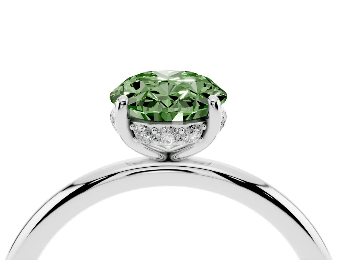 Fancy Green Oval Cut Solitaire Diamond Ring with a Classic Band and Four-Prong Setting Silver