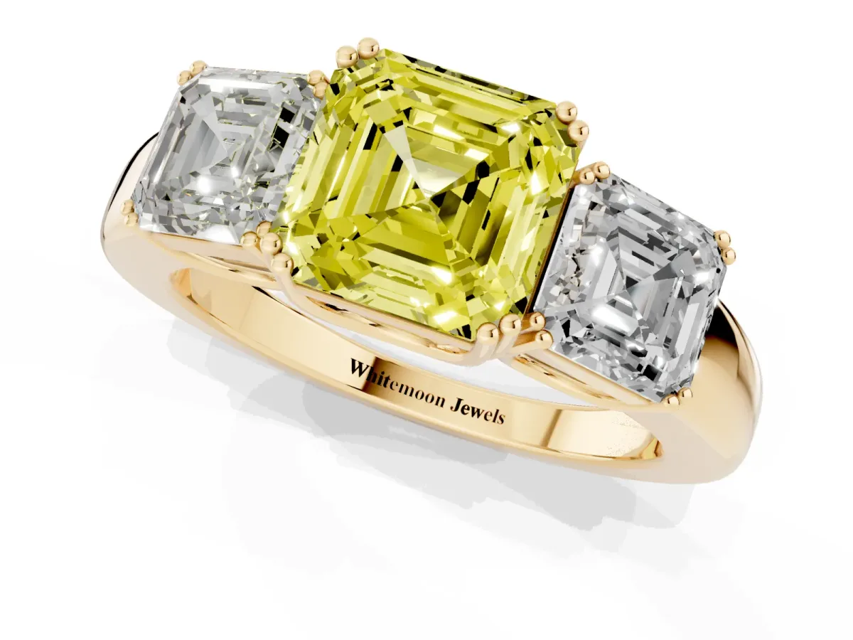Fancy Yellow Three-Stone Asscher Cut Cut Diamond Ring with Channel Set Band and Four-Prong Setting Yellow gold