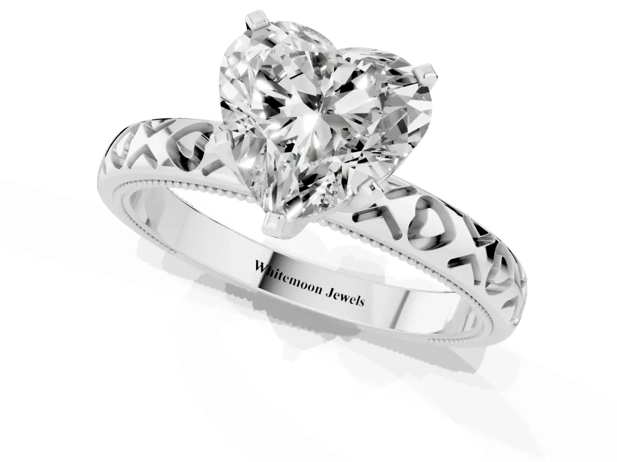 Heart Cut Solitaire Diamond Engagement Ring with XO Engraved Band and Four-Prong Setting Platinum