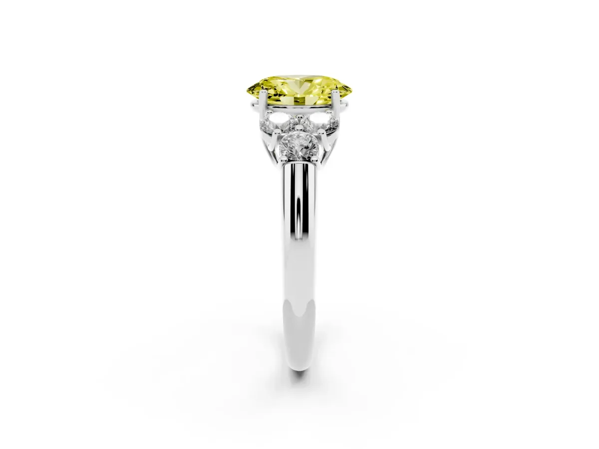 Fancy Yellow Oval Cut Cut Diamond Cluster Ring with Round Accent Stones and Prong Setting on a Classic Band Platinum