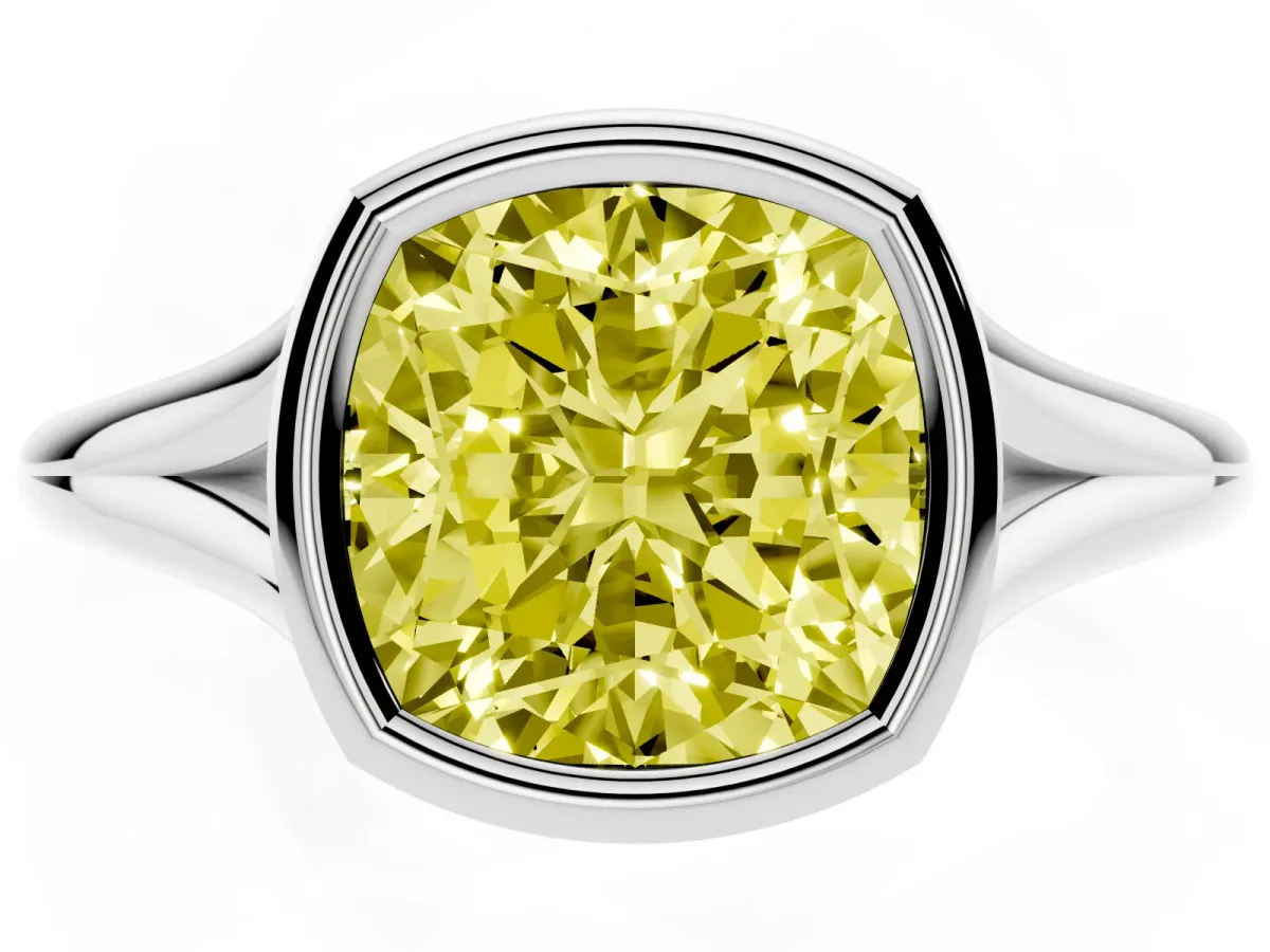 Fancy Yellow Bezel Set Cushion Cut Cut Solitaire Ring with Tapered Band White gold