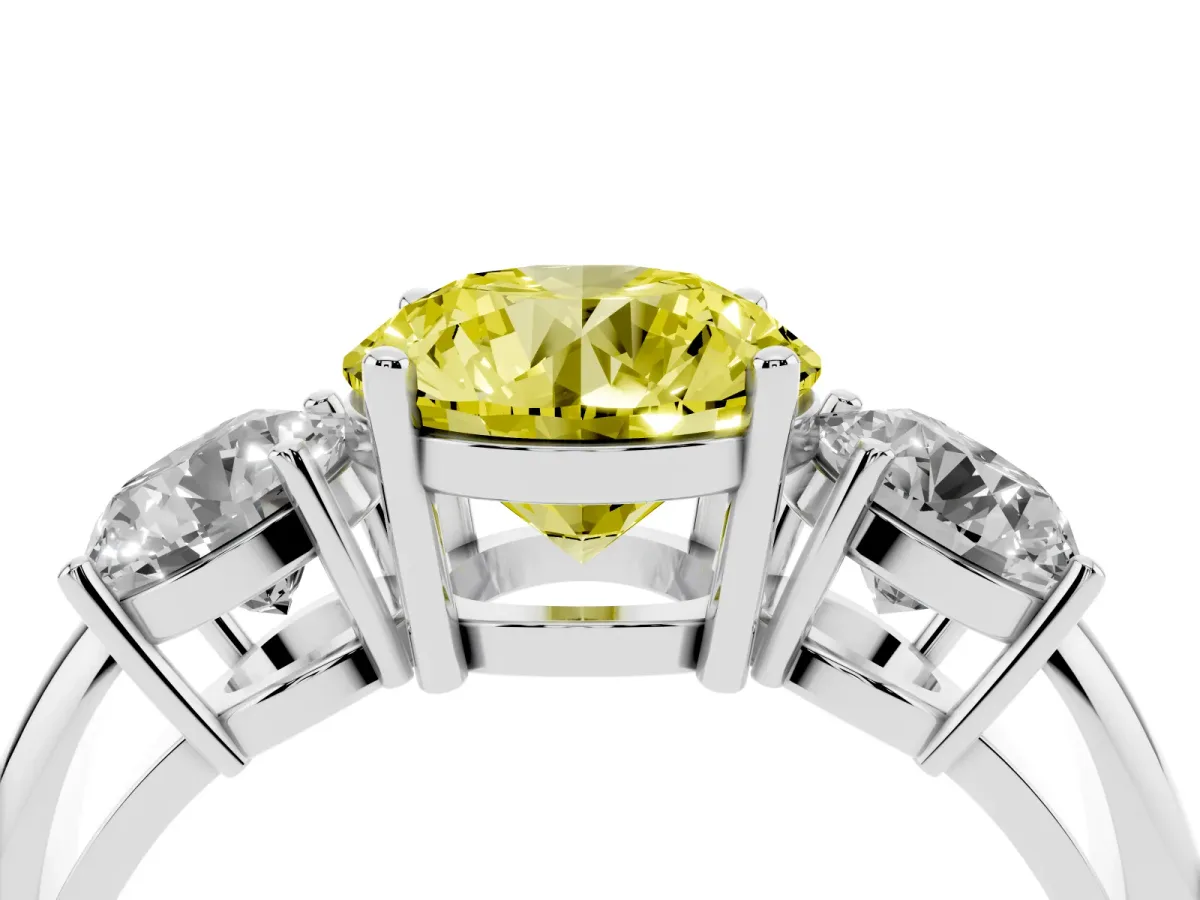 Fancy Yellow Three-Stone Round Cut Cut Diamond Engagement Ring with Prong Setting on a White Gold Band Silver