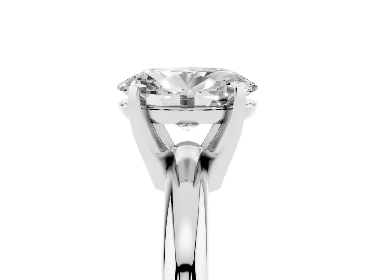 Oval Cut Diamond Solitaire Engagement Ring with Round Band and Four-Prong Setting Platinum