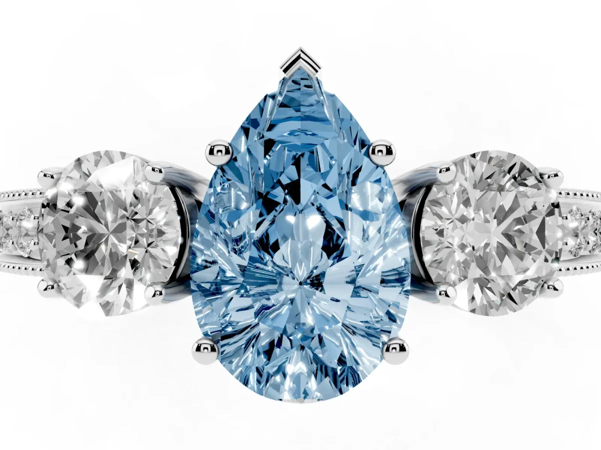 Fancy Blue Pear Cut Three-Stone Diamond Ring with Pavé Band and Four-Prong Setting Silver