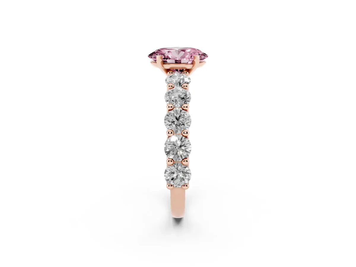 Fancy Pink Oval Cut Diamond Prong Setting with Side Stones on a Pave Band Rose gold