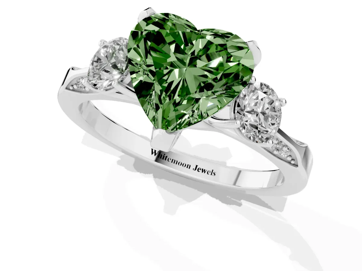 Fancy Green Heart Cut Brilliant Three-Stone Diamond Ring with Pavé Band and Four-Prong Setting Platinum