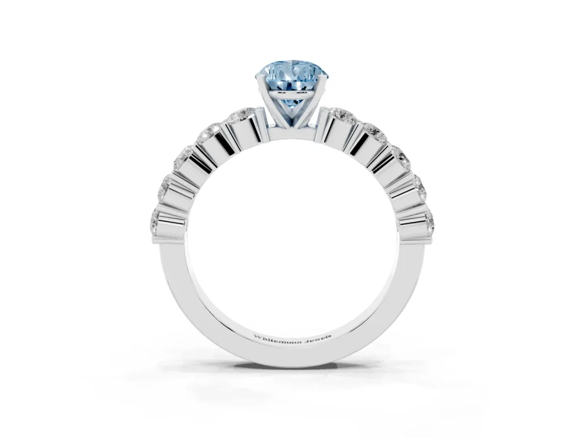 Fancy Blue Pear Cut Diamond Solitaire Ring with Shared Prong Round Side Stones Platinum
