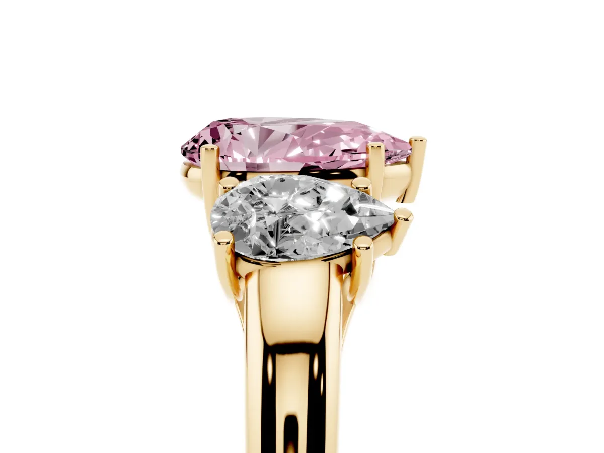 Fancy Pink Three-Stone Pear Cut Diamond Engagement Ring with Prong Setting Yellow gold