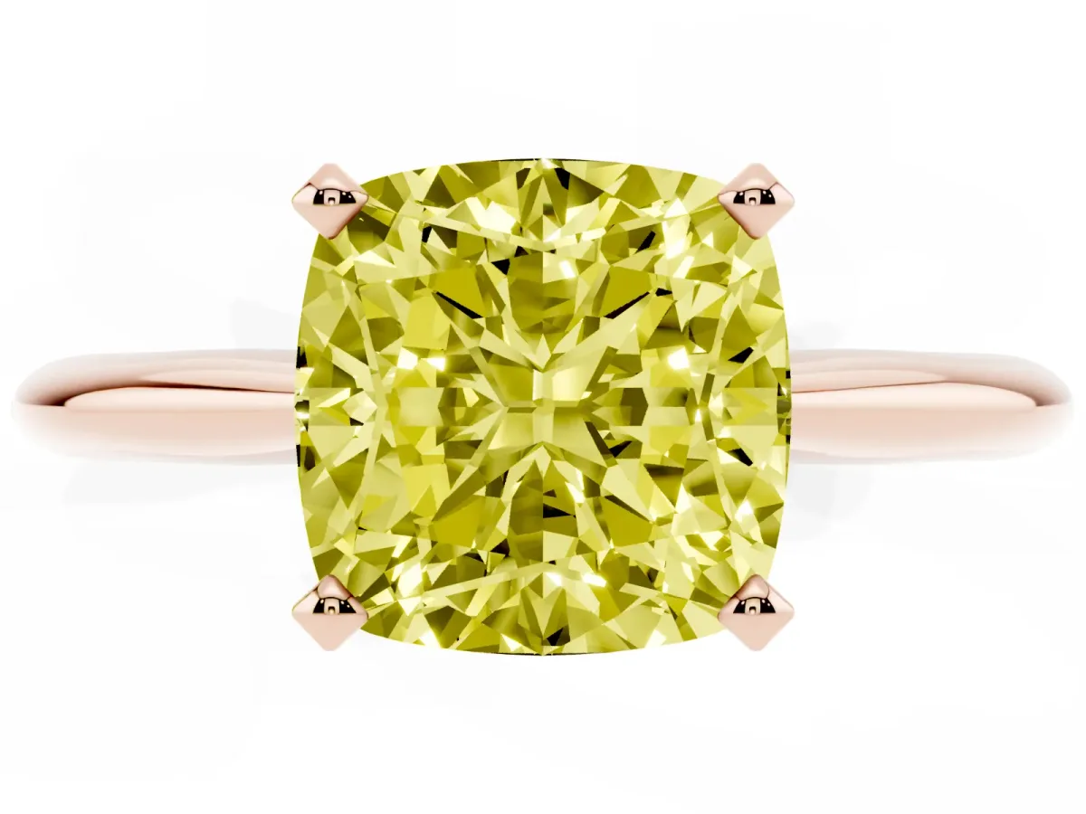 Fancy Yellow Cushion Cut Cut Solitaire Ring with Four-Prong Setting on a Classic Band Rose gold