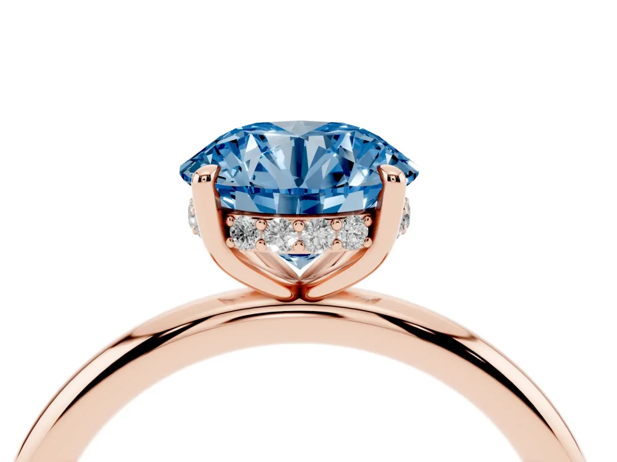 Fancy Blue Round Cut Diamond Solitaire Ring with Thin Band and Four-Prong Setting Rose gold