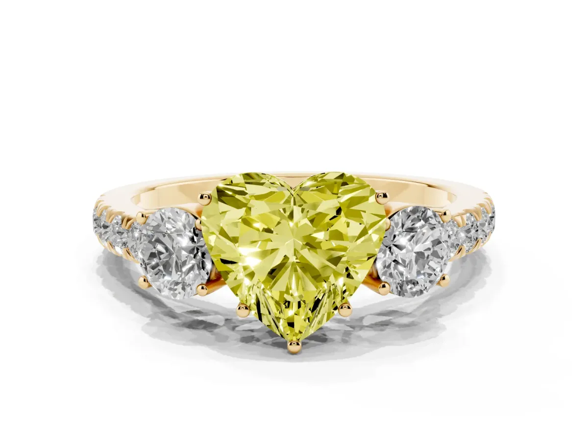 Fancy Yellow Heart Cut Cut Diamond Three-Stone Ring with Round Side Stones and Pavé Band Yellow gold