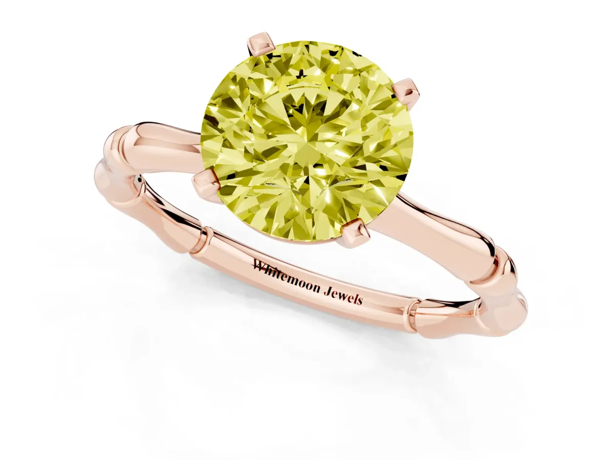 Fancy Yellow Round Cut Solitaire Diamond Ring with Bamboo Band and Four-Prong Setting Rose gold