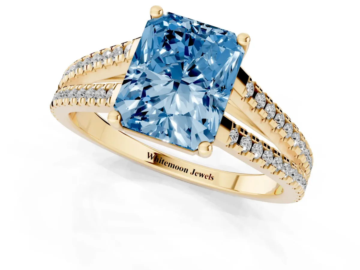 Fancy Blue Radiant Cut Diamond Solitaire Engagement Ring with Split Shank Pavé Band Yellow gold