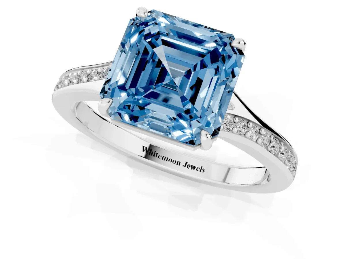 Fancy Blue Asscher Cut Diamond Solitaire Ring with Pavé Band and Prong Setting Silver