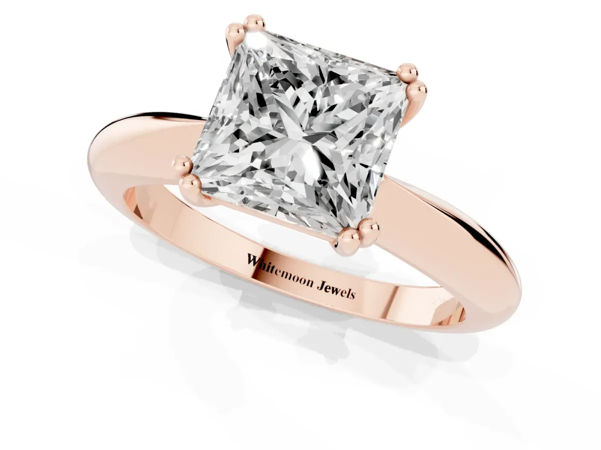 Princess Cut Cut Solitaire Engagement Ring with Tapered Band and Four-Prong Setting Rose gold