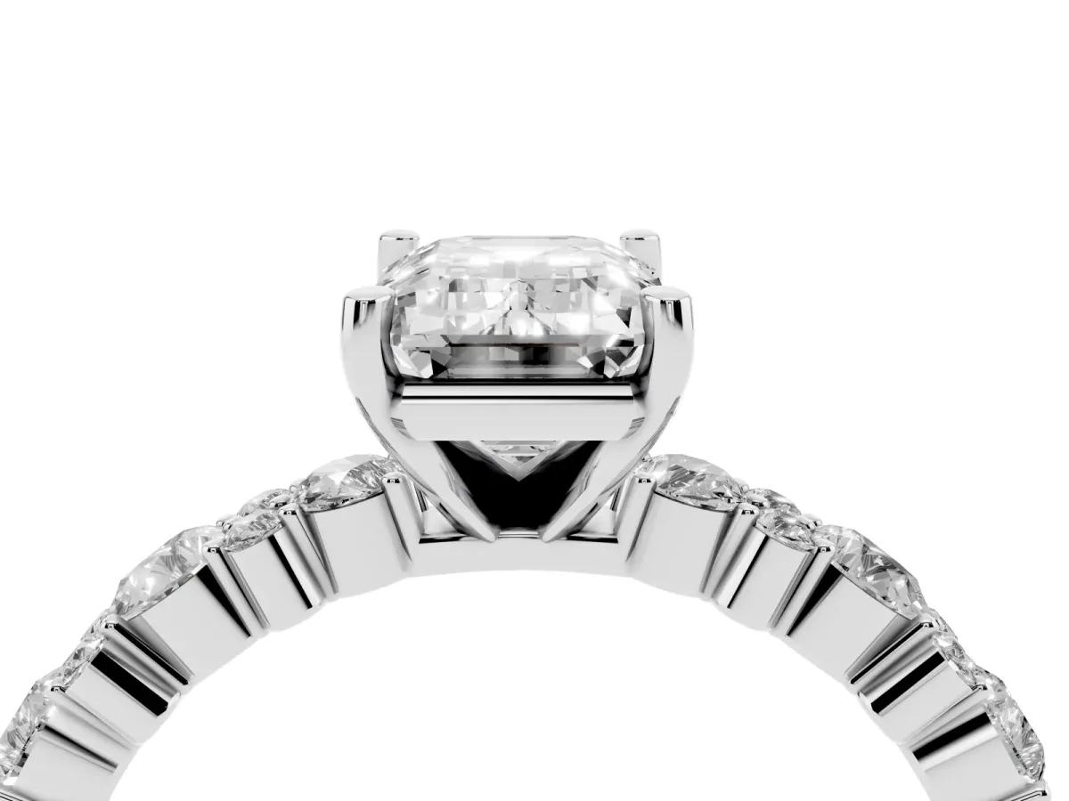 Emerald Cut Diamond Side Stone Solitaire Ring with Round and Four-Prong Setting Silver