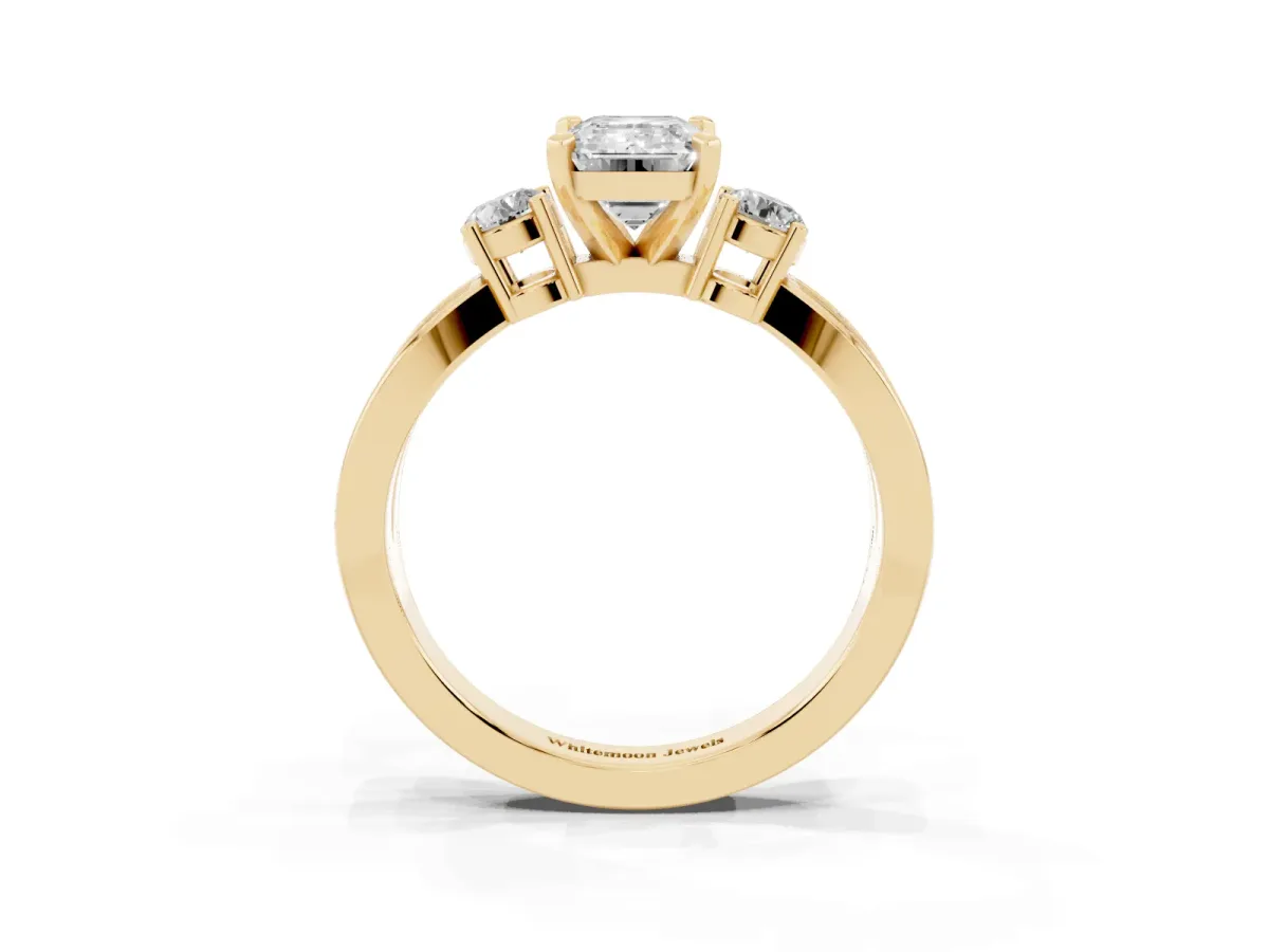 Three-Stone Emerald Cut Cut Diamond Twist Band with Prong Setting Yellow gold