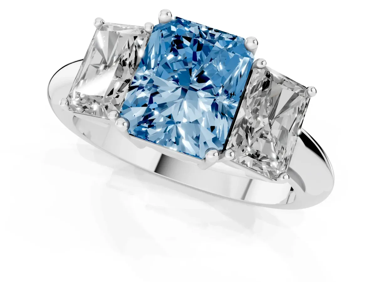 Fancy Blue Three-Stone Radiant Cut Cut Diamond Engagement Ring with Prong Setting on a White Gold Band Silver
