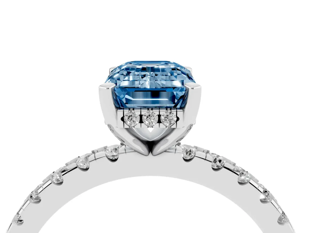Fancy Blue Emerald Cut Diamond Solitaire Ring with Round Pavé Band and Four-Prong Setting Silver