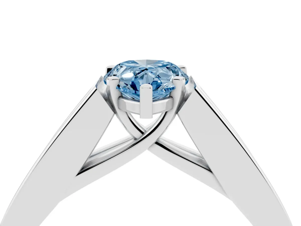 Fancy Blue Pear Cut Cut Channel Set Solitaire Ring with Four-Prong Setting Platinum