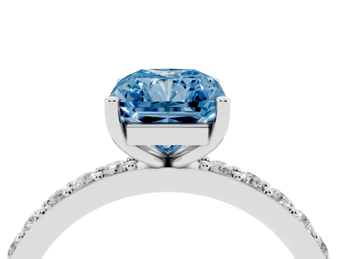 Fancy Blue Radiant Cut Cut Diamond Solitaire with Pave Band and Four-Prong Setting Silver