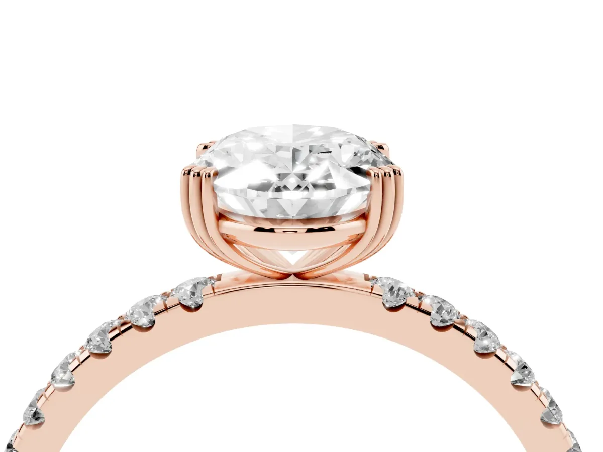 Oval Cut Brilliant Solitaire with Pavé Band and Claw Prong Setting Rose gold