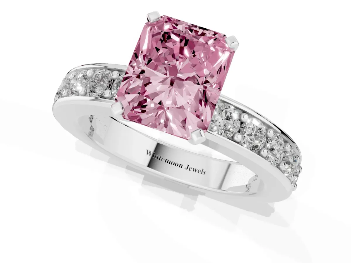 Fancy Pink Radiant Cut Diamond Engagement Ring with Channel Set Round Band and Prong Setting Platinum