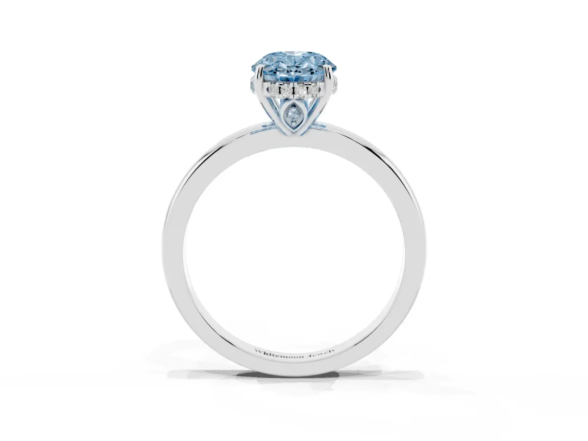 Fancy Blue Oval Cut Solitaire Diamond Ring with Prong Setting and Plain Band Platinum