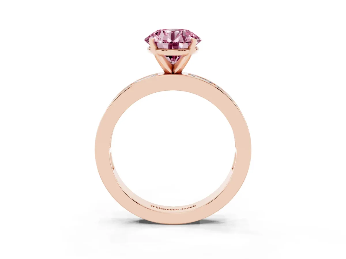Fancy Pink Round Cut Solitaire Diamond Ring with Channel-Set Baguette Band and Four-Prong Setting Rose gold