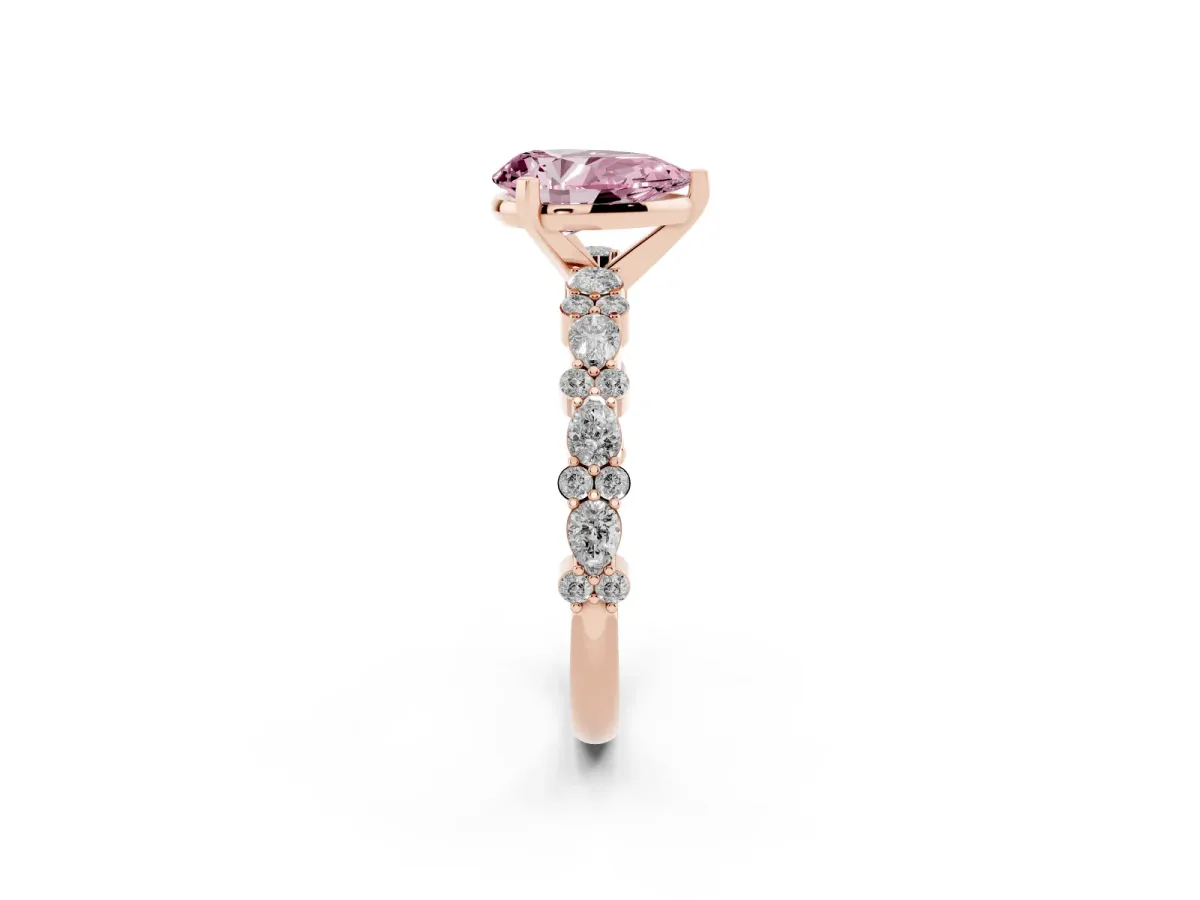 Fancy Pink Pear Cut Diamond Side Stone Solitaire Ring with Round and Four-Prong Setting Rose gold