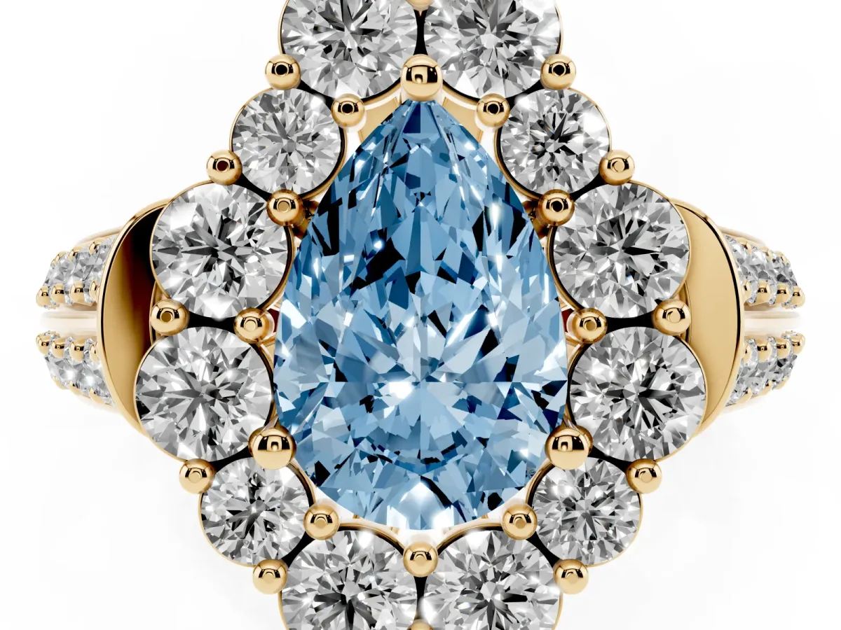 Fancy Blue Pear Cut Halo Diamond Engagement Ring with Split Shank and Prong Setting Yellow gold