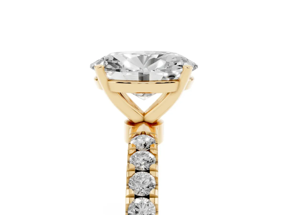 Oval Cut Diamond Solitaire Ring with Pavé Accents and Four-Prong Setting Yellow gold